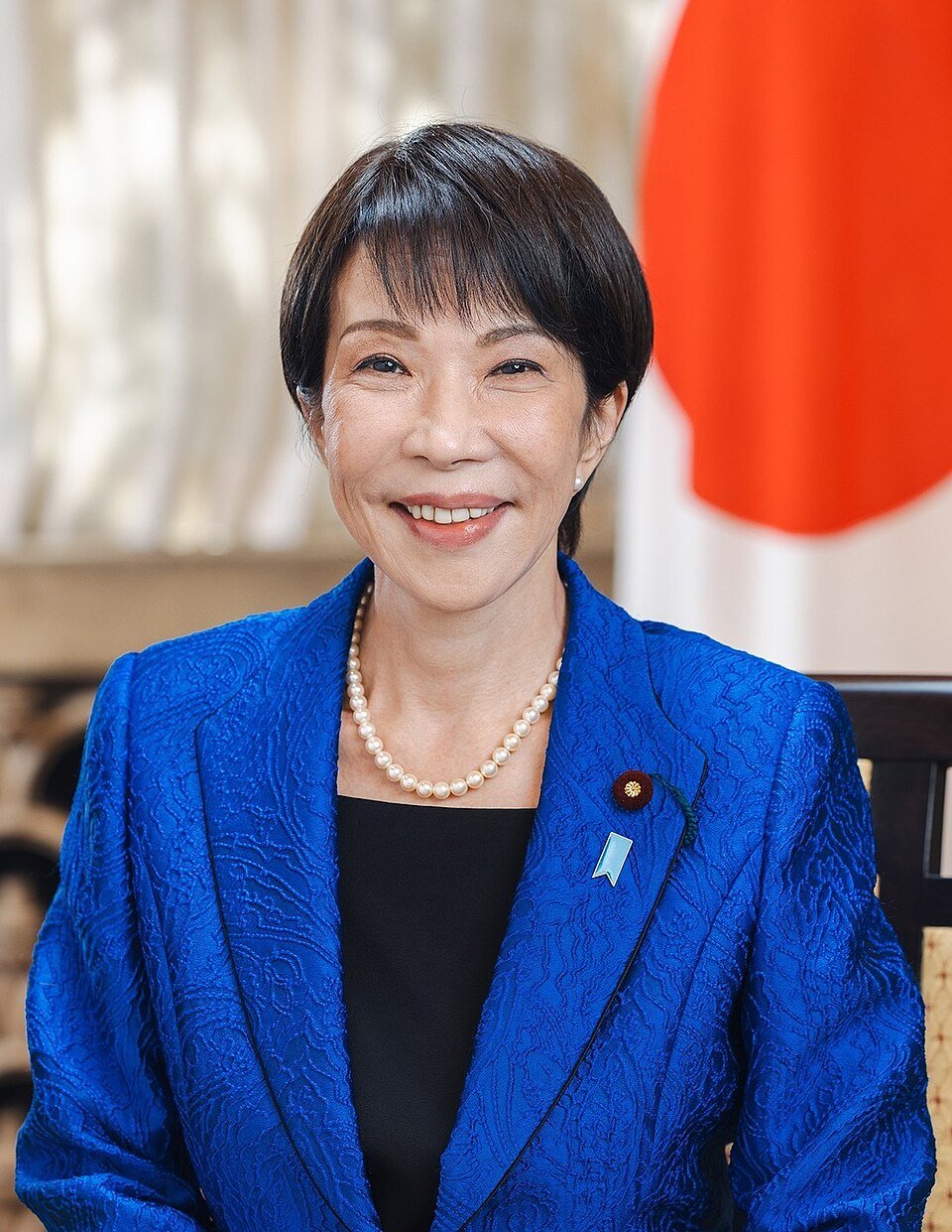 Photo by: https://en.wikipedia.org/wiki/Sanae_Takaichi